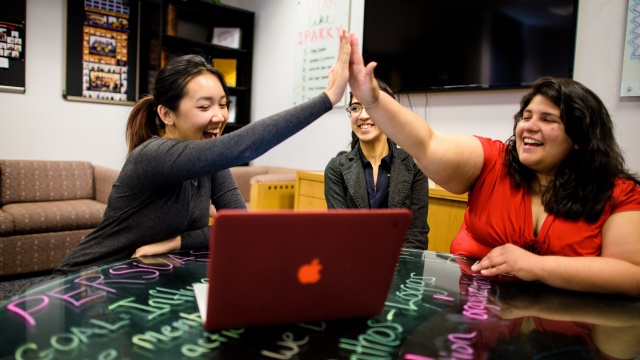 Team members high-five
